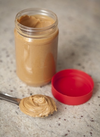 does peanut butter help dogs poop