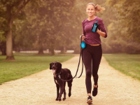 Woman running with Dexas Petware BottlePocket