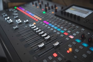 close up of audio mixer controls