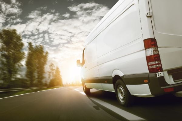 delivery truck driving down the highway