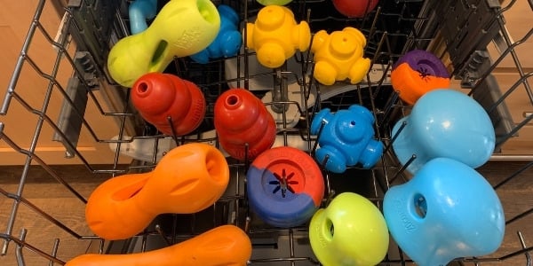 dog toys getting washed in the dishwasher