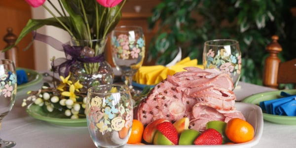 easter ham on decorated dinner table