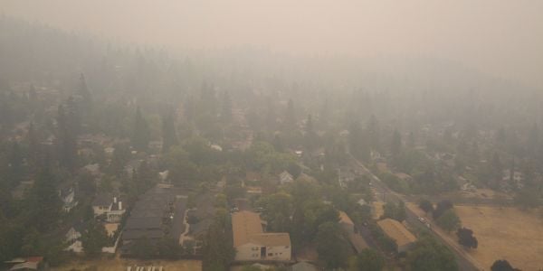forest fire smoke causing respiratory issues for a community