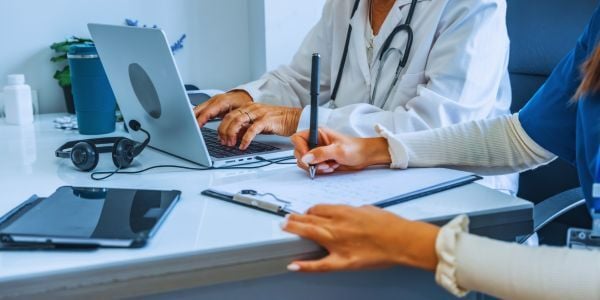Virtual Scribes and Physician Time Spent on Electronic Health Records